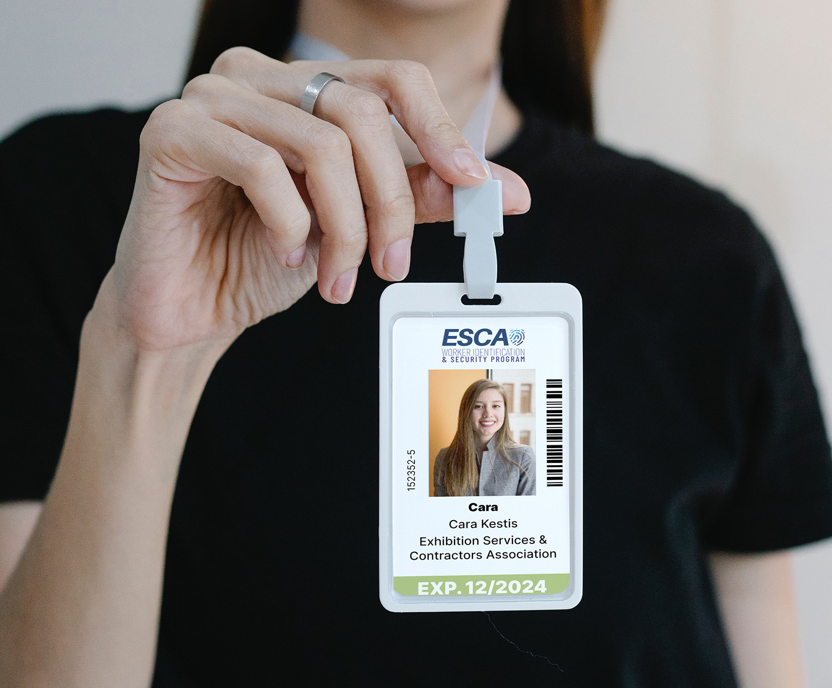 Holding badge